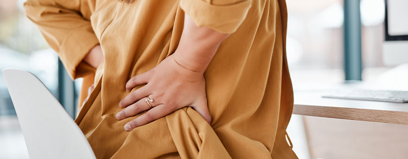 patient needing back pain in need of shockwave therapy in Flower Mound