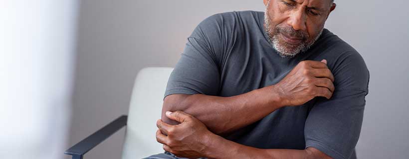 patient needing elbow pain in need of shockwave therapy in Flower Mound